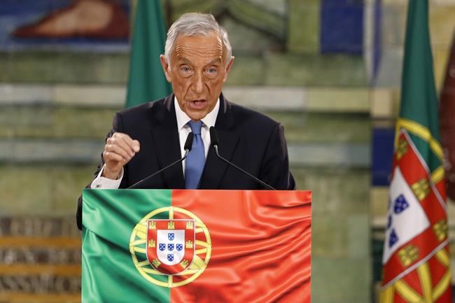 FILE - Portugal's Incumbent President Marcelo Rebelo de Sousa delivers a speech following the results of Portugal's presidential election, in Lisbon, Monday, Jan. 25, 2021. Portugal’s president on Thursday, Nov. 4, 2021 announced he is dissolving parliament and calling a snap election for Jan. 30, following the minority Socialist government’s defeat in a key vote on the country’s spending plans. The announcement was widely expected. (AP Photo/Armando Franca, File)