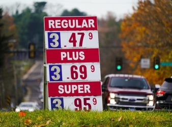 Gasoline prices are displayed at a station in Huntingdon Valley, Pa., Wednesday, Nov. 17, 2021. OPEC and allied oil-producing countries meet Thursday, Dec. 2, 2021, under the shadow of a surprise new COVID-19 threat, with uncertainty over the omicron variant's future impact on the global economic recovery hanging over their decision on how much oil to pump to a world that is paying more for gasoline. (AP Photo/Matt Rourke)