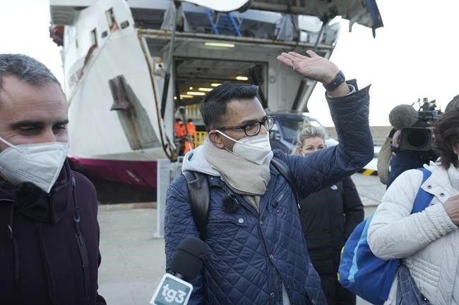 Kevin Rebello, brother of Russel Rebello, a waiter who died in the shipwreck of the Costa Concordia cruise ship, arrives in the tiny Tuscan island of Isola del Giglio, Italy, Wednesday, Jan. 12, 2022. Italy on Thursday, Jan. 13, 2022, is marking the 10th anniversary of the Concordia disaster with a daylong commemoration, honoring the 32 people who died but also the extraordinary response by the residents of Giglio who took in the 4,200 passengers and crew from the ship on that rainy Friday night and then lived with the Concordia carcass for another two years before it was hauled away for scrap. (AP Photo/Andrew Medichini)