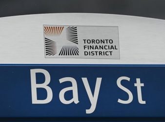 A street sign along Bay Street in Toronto's financial district is shown on Tuesday, January 12, 2021. THE CANADIAN PRESS/Nathan Denette