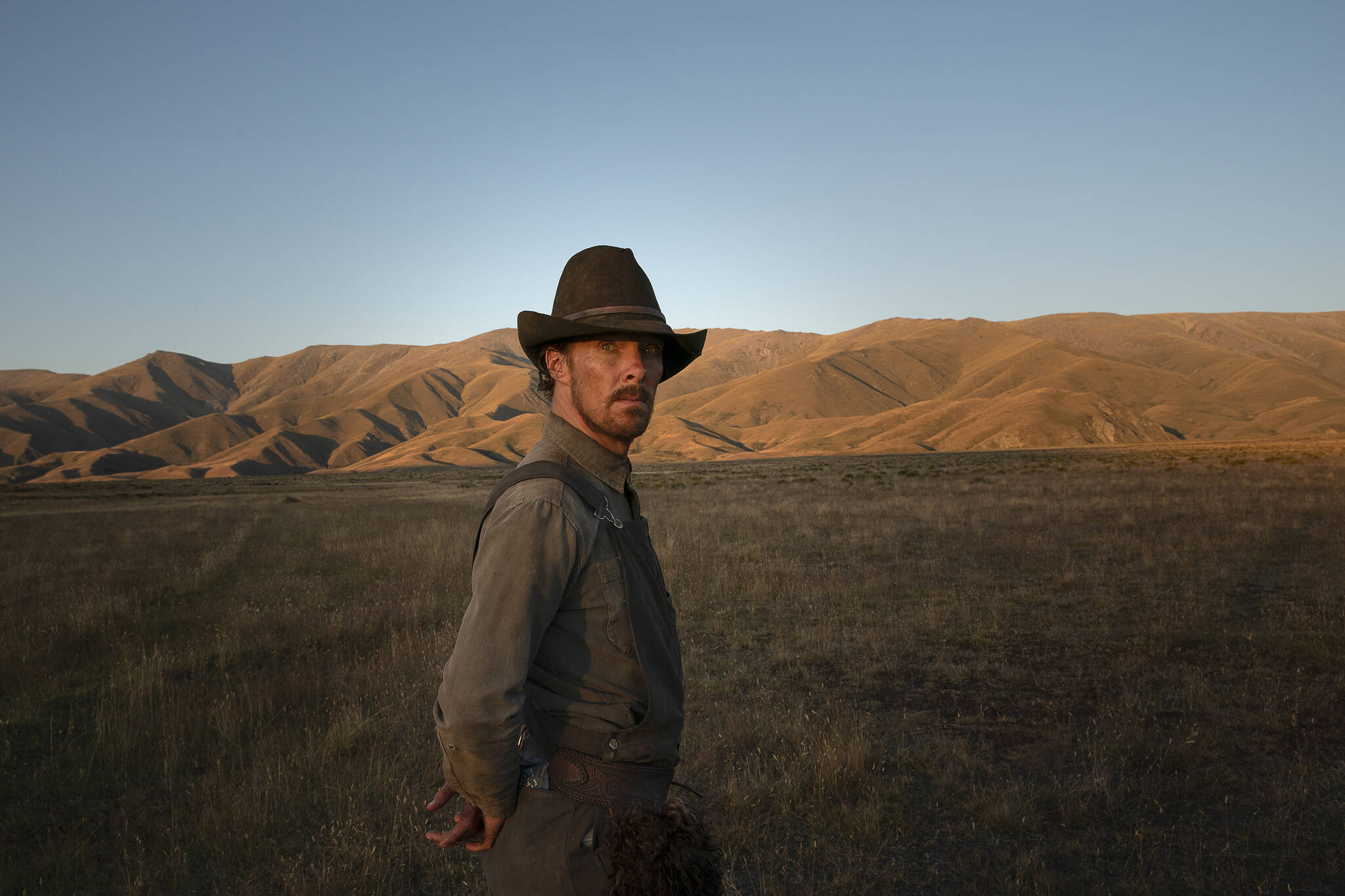 <p>Benedict Cumberbatch plays the film’s central character, Phil Burbank, a deeply conflicted cowboy running a cattle ranch with his brother in 1920s Montana. (Kirsty Griffin / Netflix)</p>